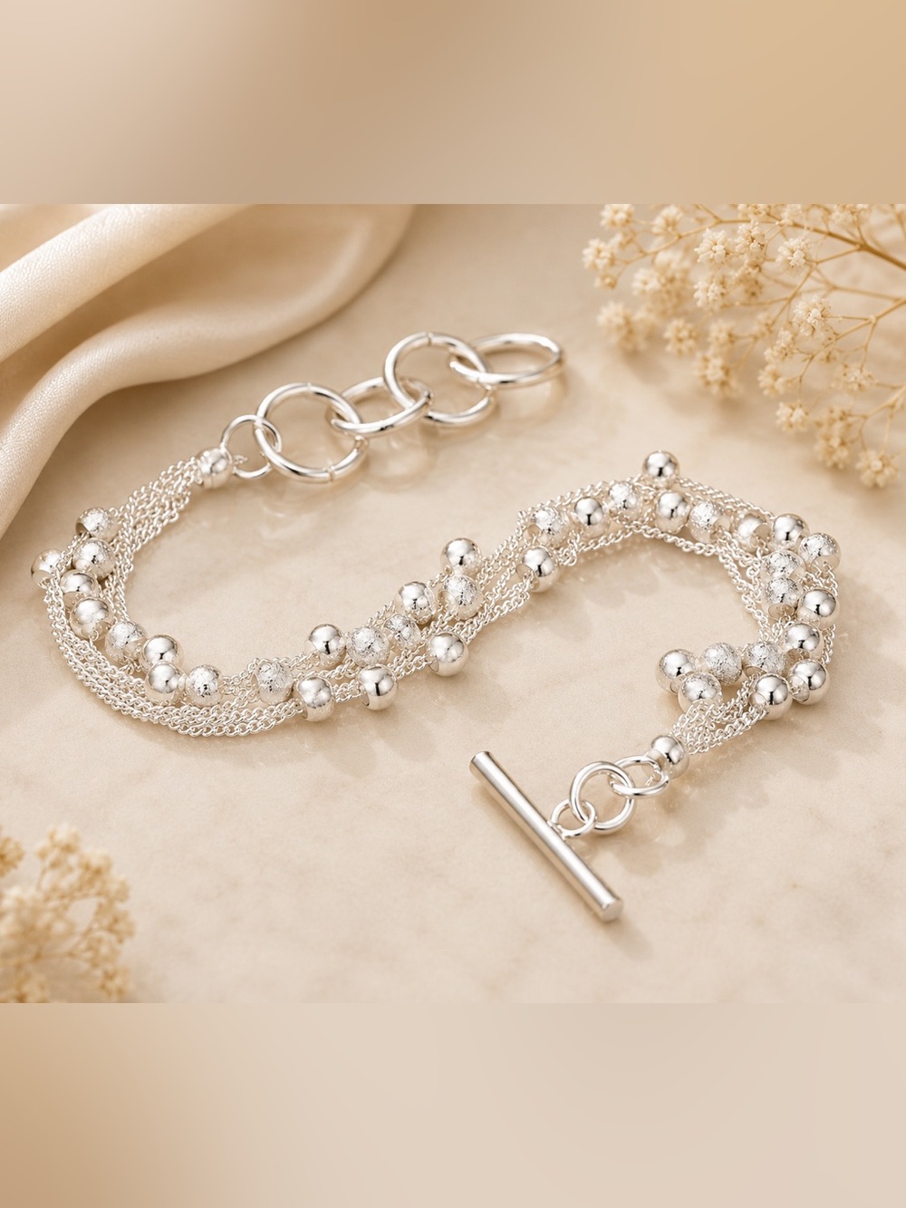 Sterling Silver Multi-Strand Bead Bracelet - Elegant Silver Design